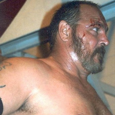 bearded daddy muscleman husky stocky fighter kicking ass in street brawl match