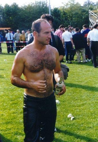 men lubed up ready to wrestle oily matches