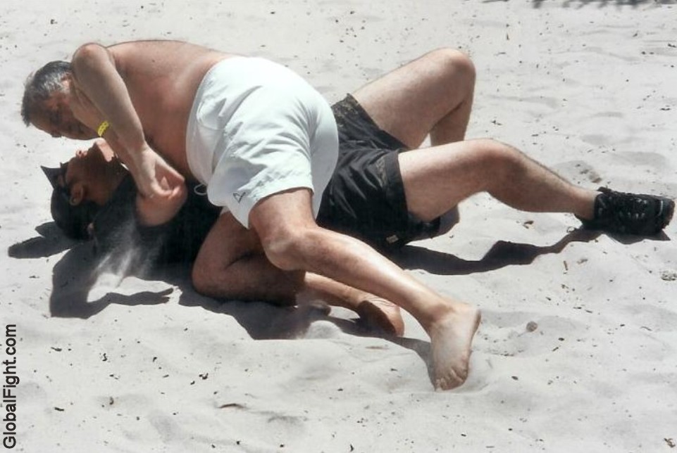 sandy guys beach fighting men